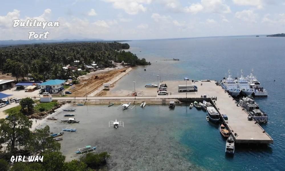 Aerial view of Buliluyan Port in Palawan with docked boats, essential for understanding How to Get to Balabac, Palawan on a tour.