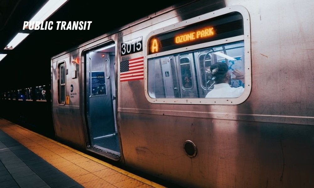 A subway train stopped at a station platform, showcasing essential Budget Travel Tips for Expensive USA Cities for solo women.